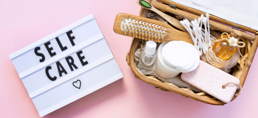 Self-care,Word,On,Lightbox,On,Pink,Background,Flat,Lay.,Natural